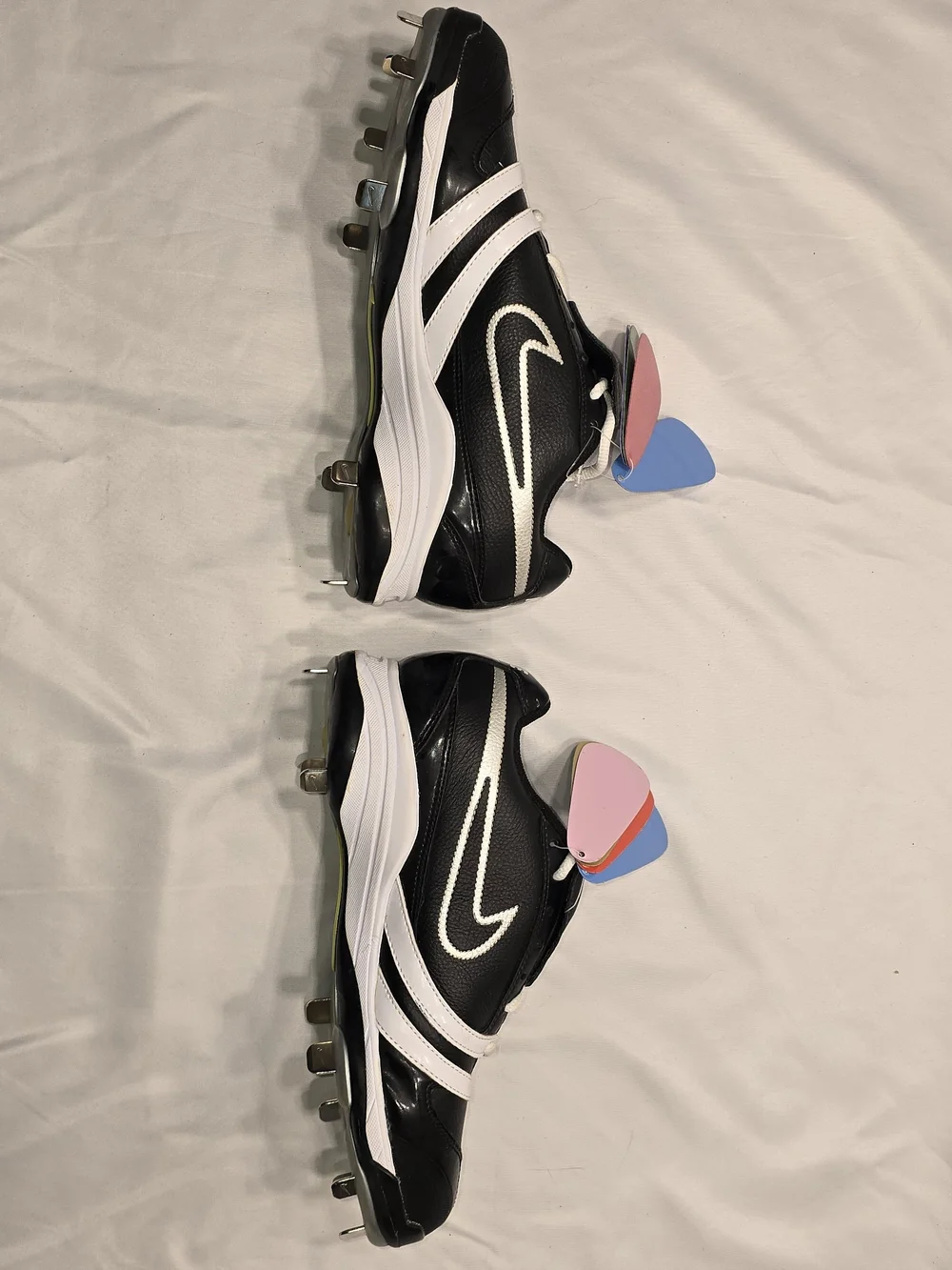Nike Black and White Baseball Cleats with Colored Heel Tabs